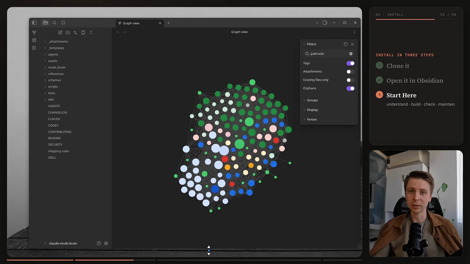 The Claude Mods Brain open in Obsidian's graph view: more than a hundred linked notes clustered by type, with Daniel on camera to the right
