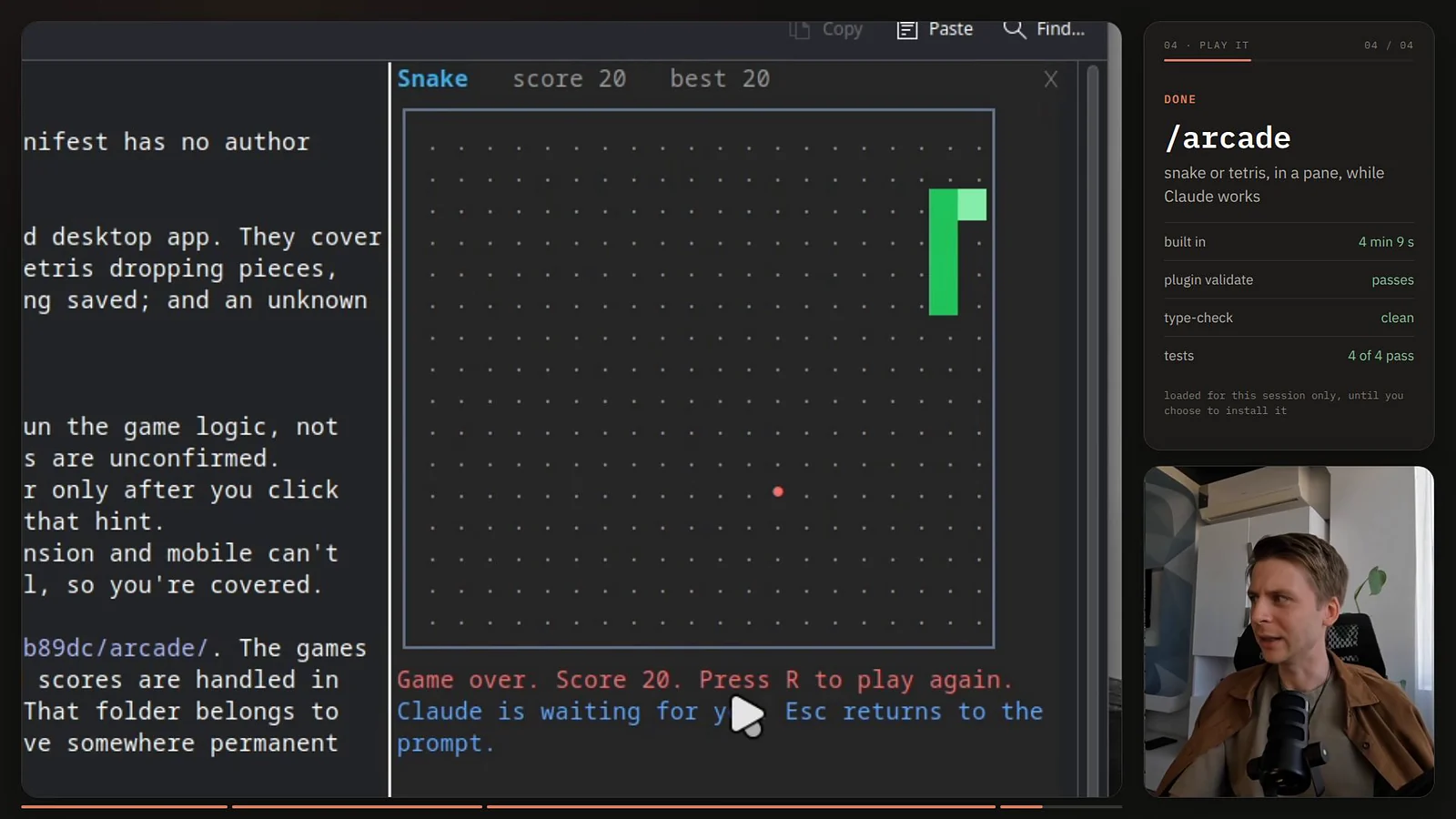 A game of Snake running in a pane inside Claude Code, score 20, with the game over message Press R to play again